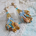 BO Cheyenne avec dagues en verre, sequins en nacre, feuilles en verre, rocailles et clous d'oreilles en m&eacute;tal