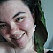 Boucles d'oreilles cœurs en crochet avec perles colorées.