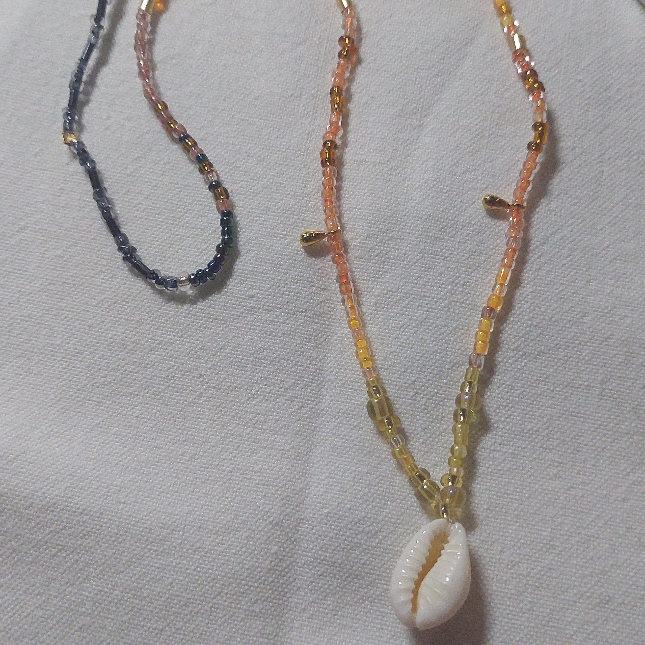 Collier coucher de soleil sur l'oc&eacute;an