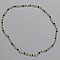 Ras du cou &eacute;lastique dor&eacute; et noir en perles de rocaille