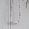 Ras du cou Smiley couleur pastel
