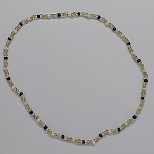 Ras du cou &eacute;lastique dor&eacute; et noir en perles de rocaille